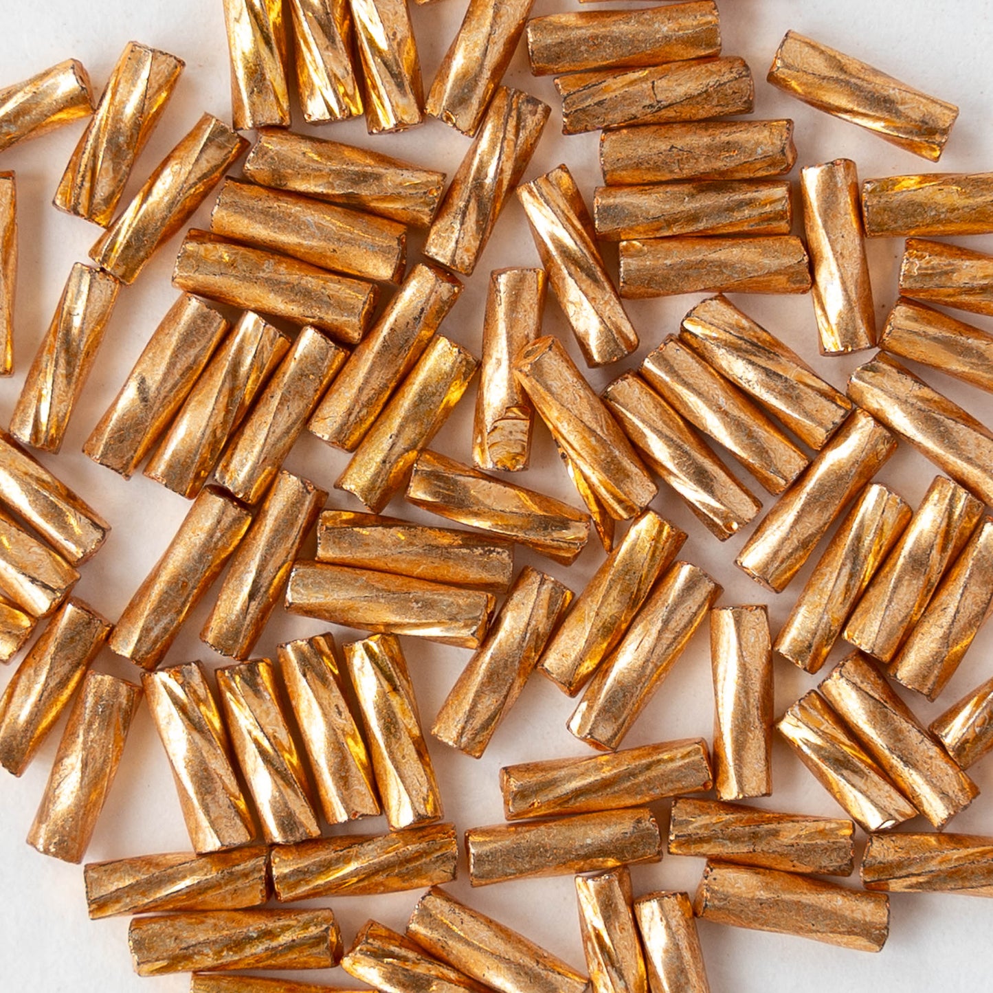 7mm Twisted Bugle Beads - Metallic Gold - 20 grams