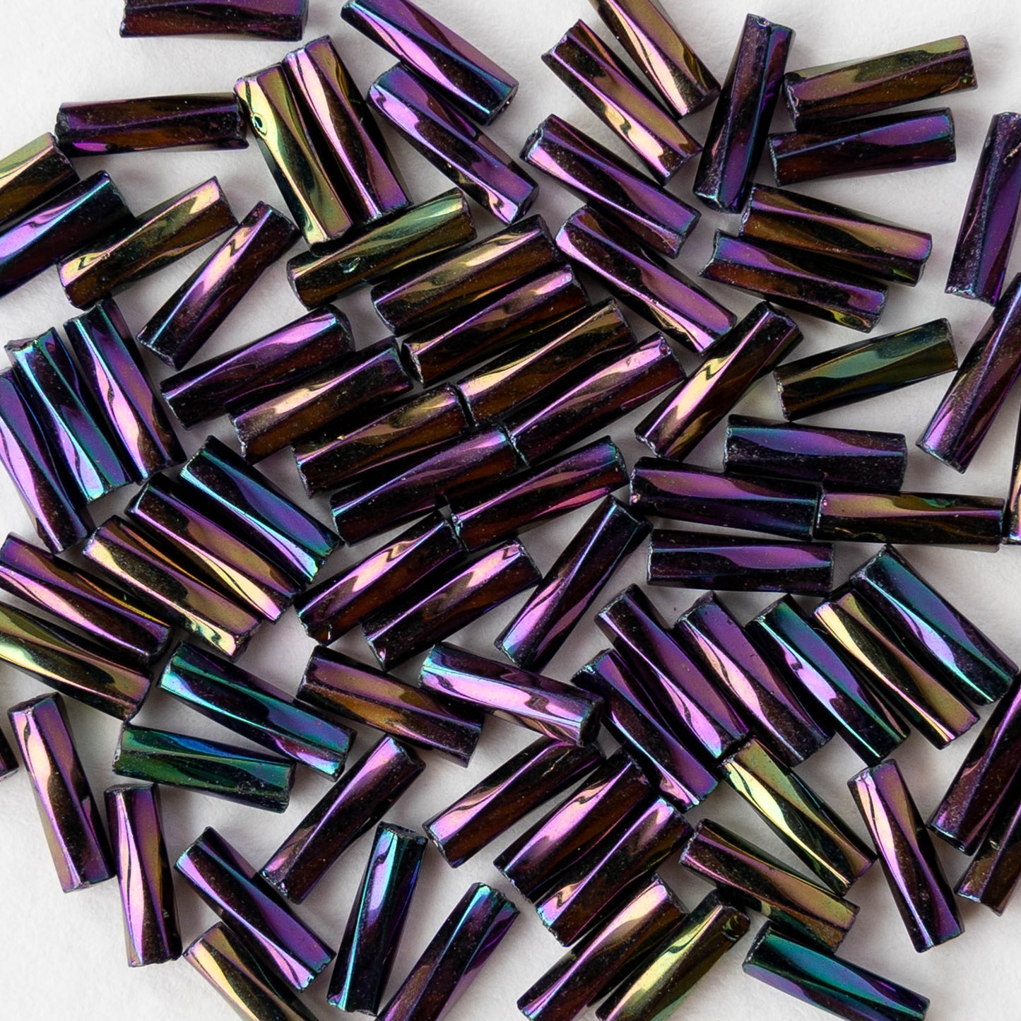 7mm Twisted Bugle Beads - Metallic Purple Iris - 20 inch strand ~80 beads