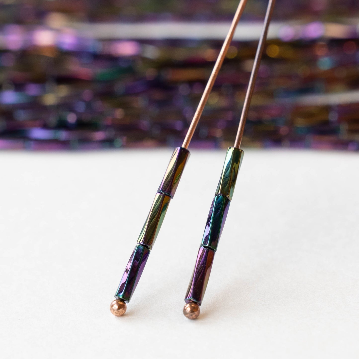 7mm Twisted Bugle Beads - Metallic Purple Iris - 20 inch strand ~80 beads