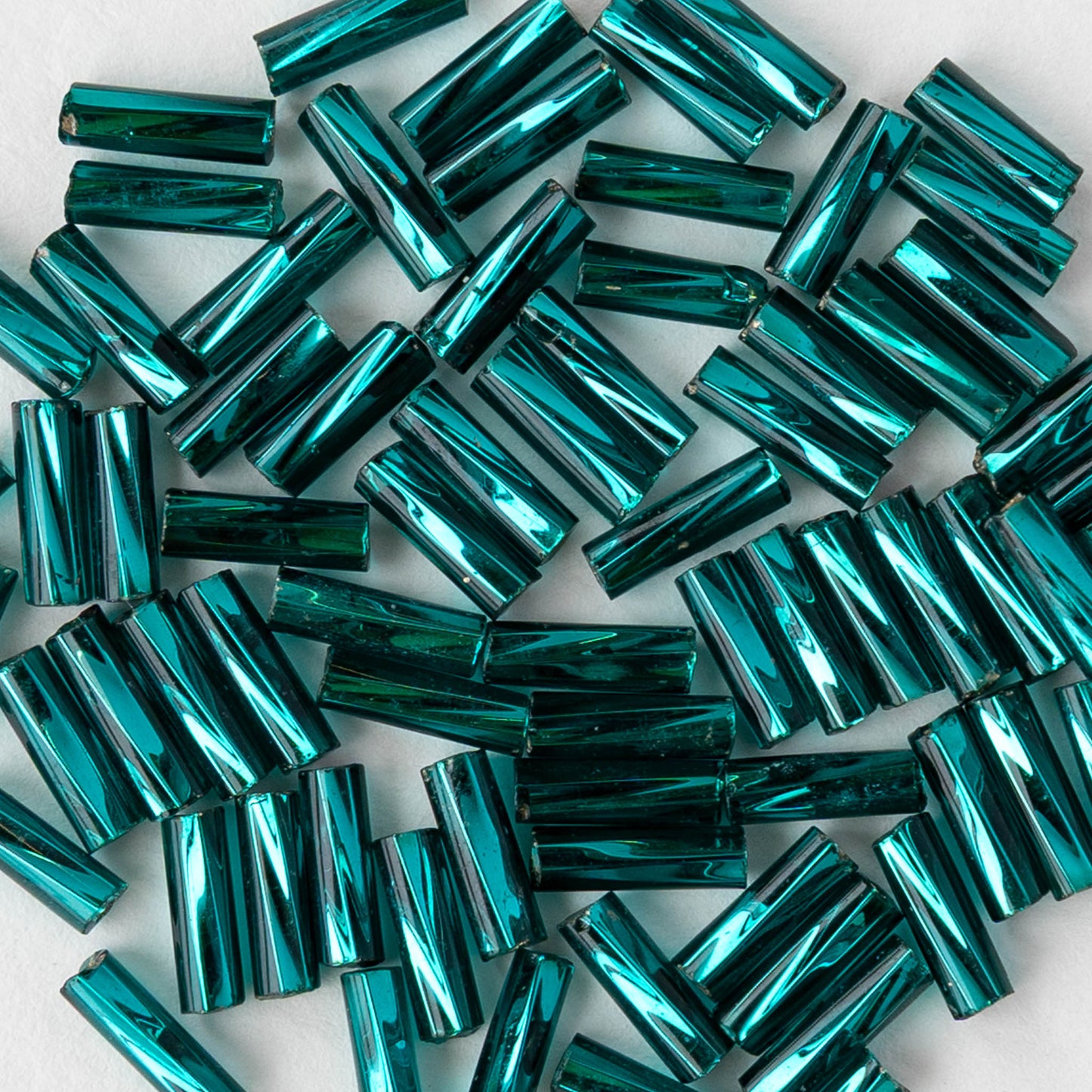 7mm Twisted Bugle Beads - Metallic Teal - 20 inch strand ~80 beads