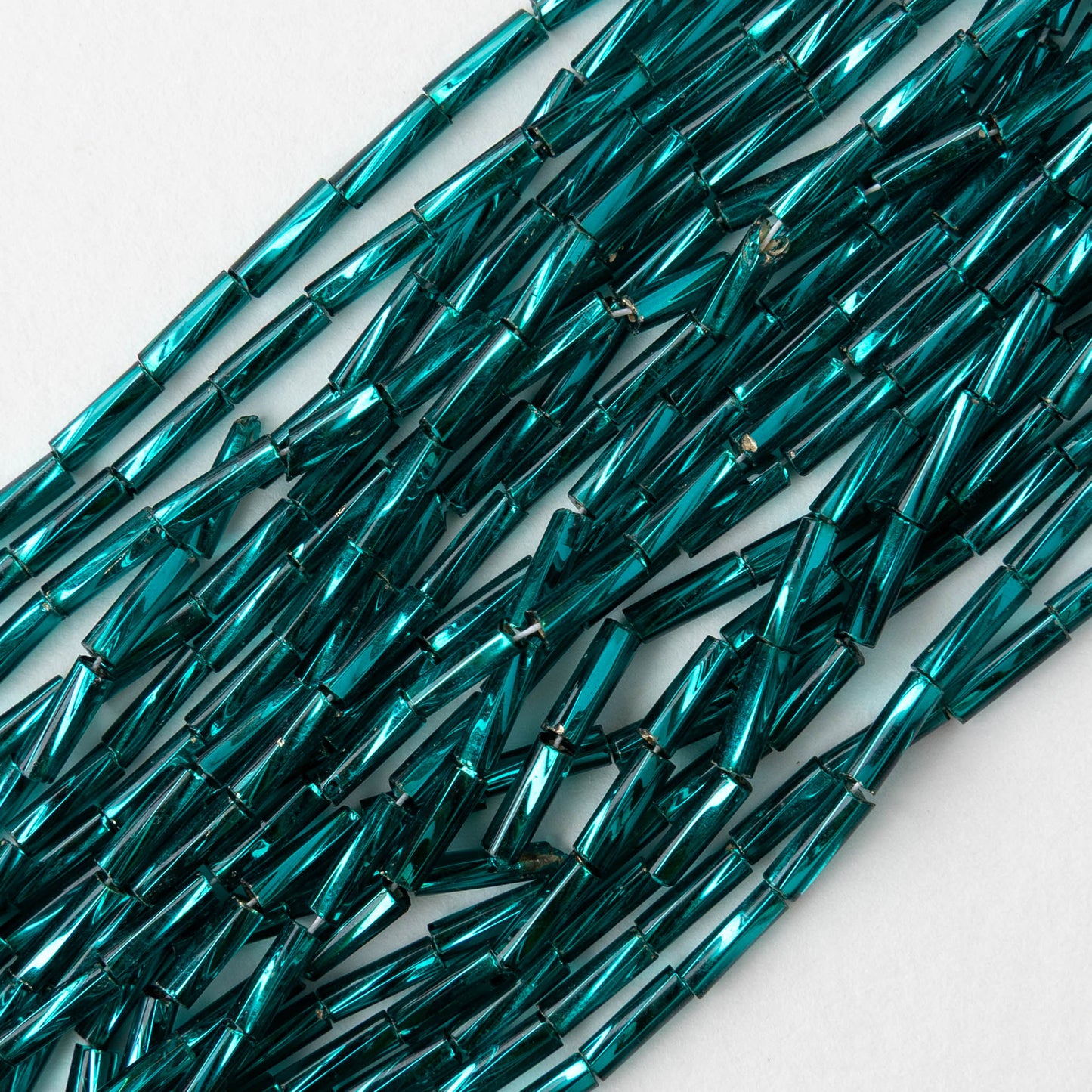 7mm Twisted Bugle Beads - Metallic Teal - 20 inch strand ~80 beads