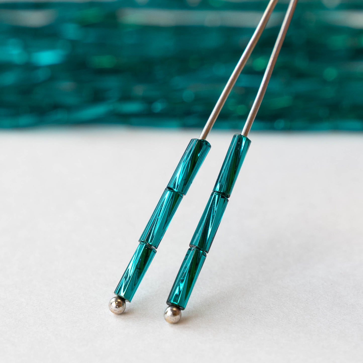 7mm Twisted Bugle Beads - Metallic Teal - 20 inch strand ~80 beads