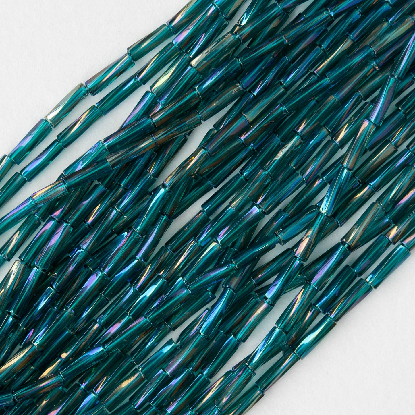 7mm Twisted Bugle Beads - Metallic Teal AB - 20 inch strand ~80 beads