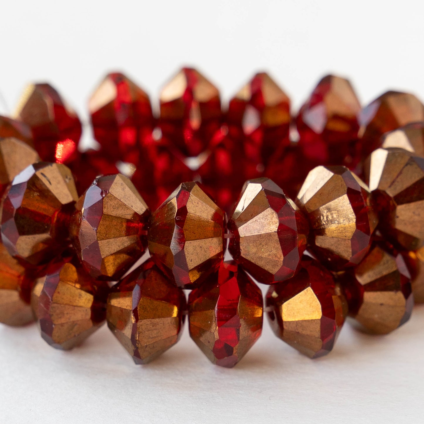 7x11mm Faceted Glass Saucer Bead - Red with Bronze - 10 beads