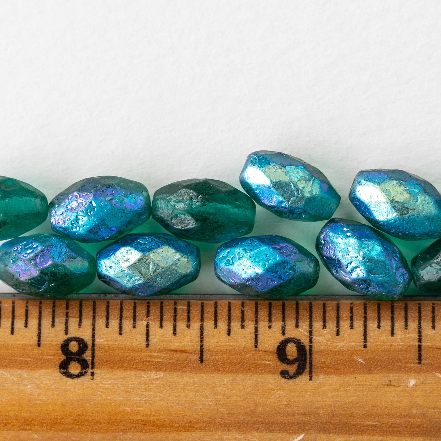 12mm Faceted Oval Beads - Etched Emerald Green AB - 12 beads