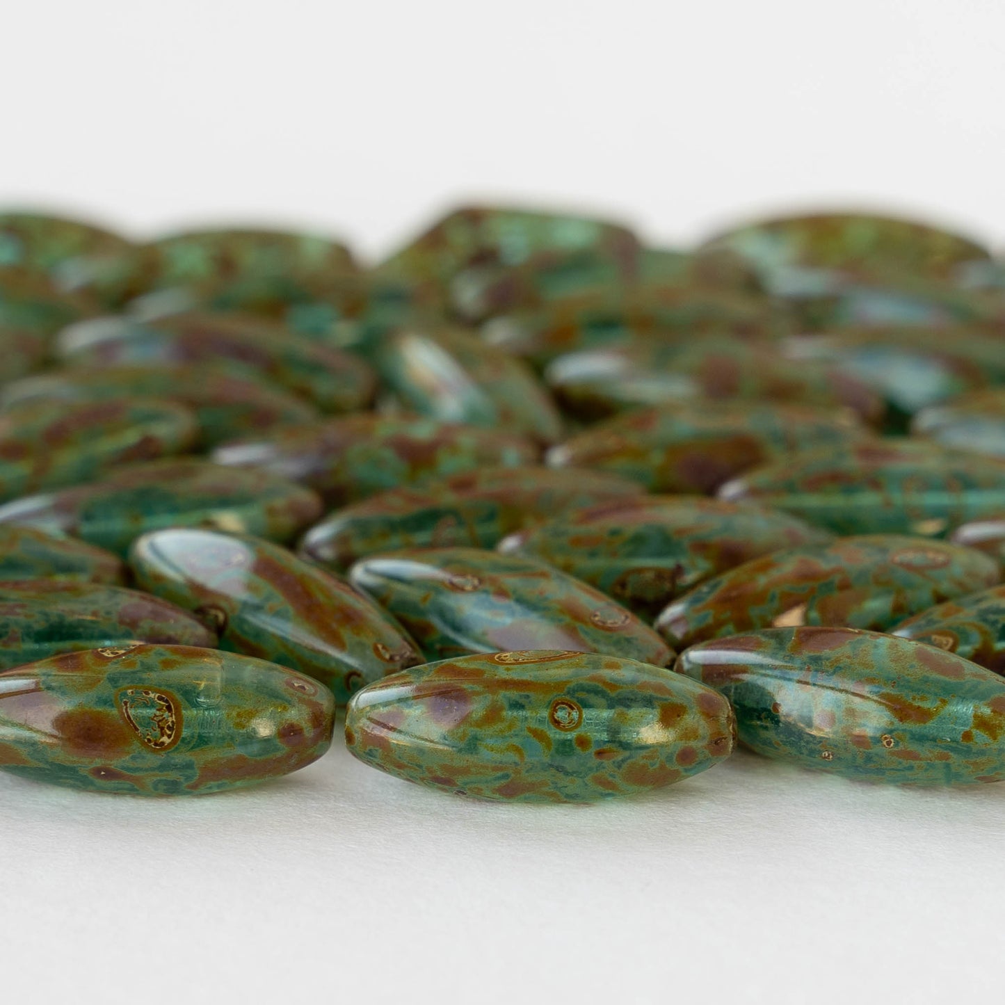 7x19mm Glass Oval Beads - Transparent Aqua with Picasso Finish - 10 beads