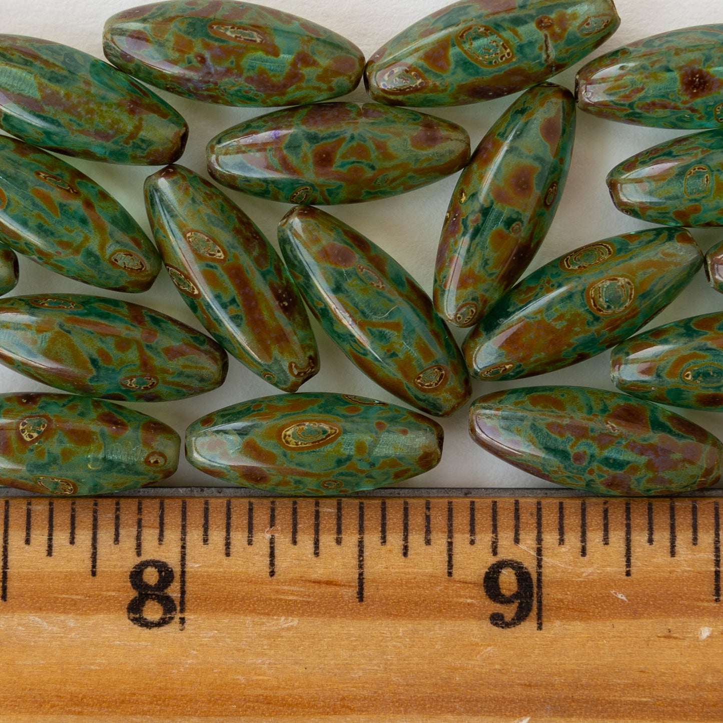 7x19mm Glass Oval Beads - Transparent Aqua with Picasso Finish - 10 beads