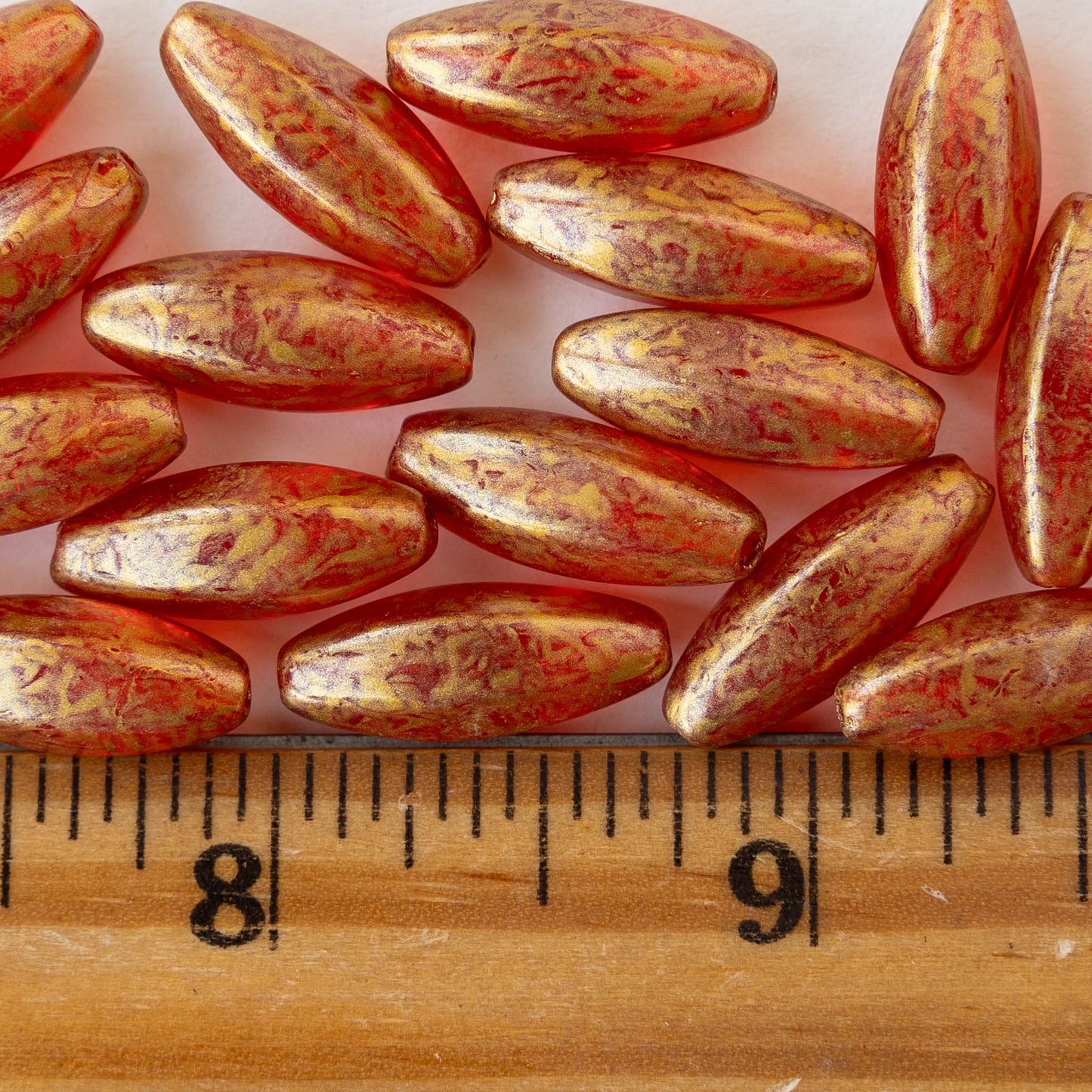 7x19mm Glass Oval Beads - Red with Gold Dust - 10 beads