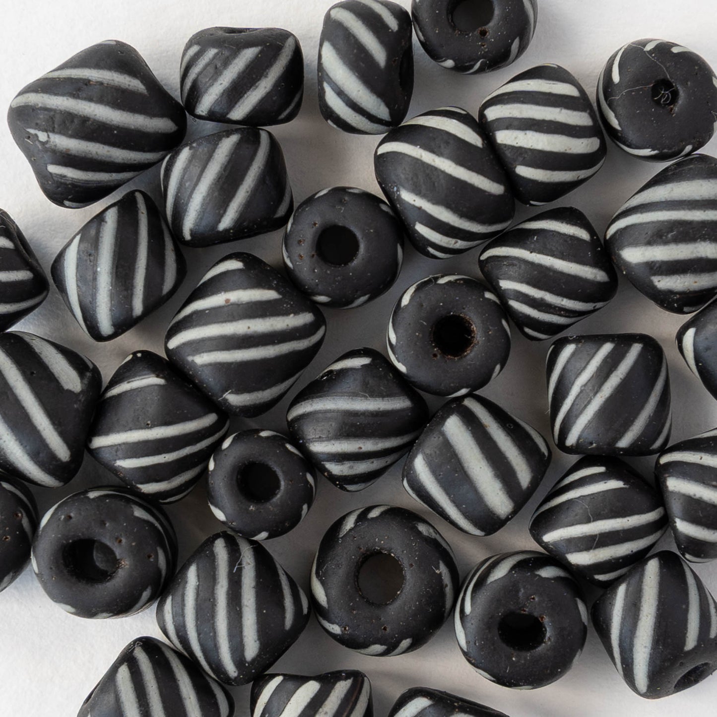 8mm Java Tube Beads - Black with White Stripes - Whole or Half Strand