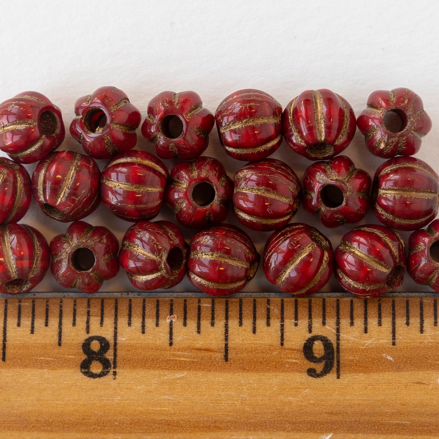 Load image into Gallery viewer, 8mm Melon Bead - Ruby Red with Bronze - 10 Beads
