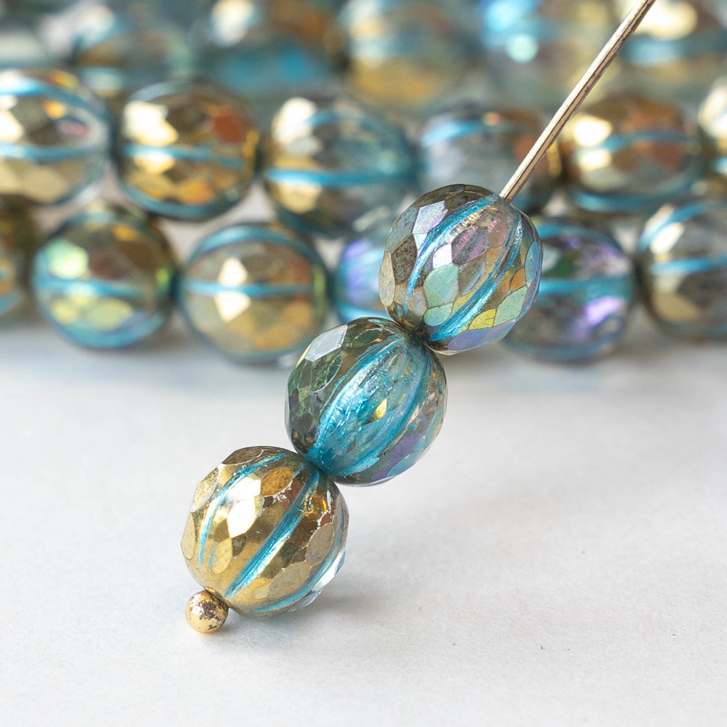 8mm Faceted Round Melon Beads - Emerald with Cobalt Finish and
