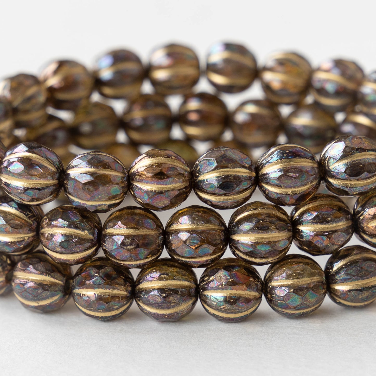 Load image into Gallery viewer, 8mm Faceted Round Melon Beads -  Amber with Bronze Luster Gold Wash - 10 beads
