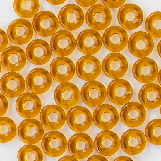 8mm Glass Ring Beads - Transparent Amber - 50 or 100