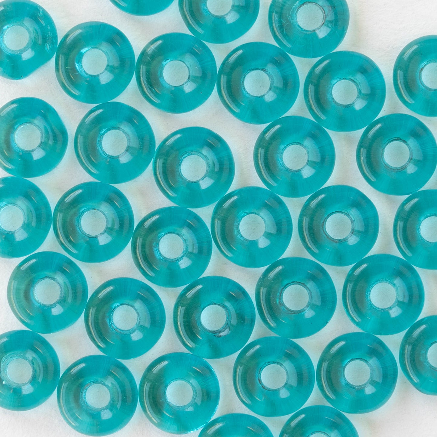 8mm Glass Ring Beads -Transparent Teal Blue - 50 or 100 Beads