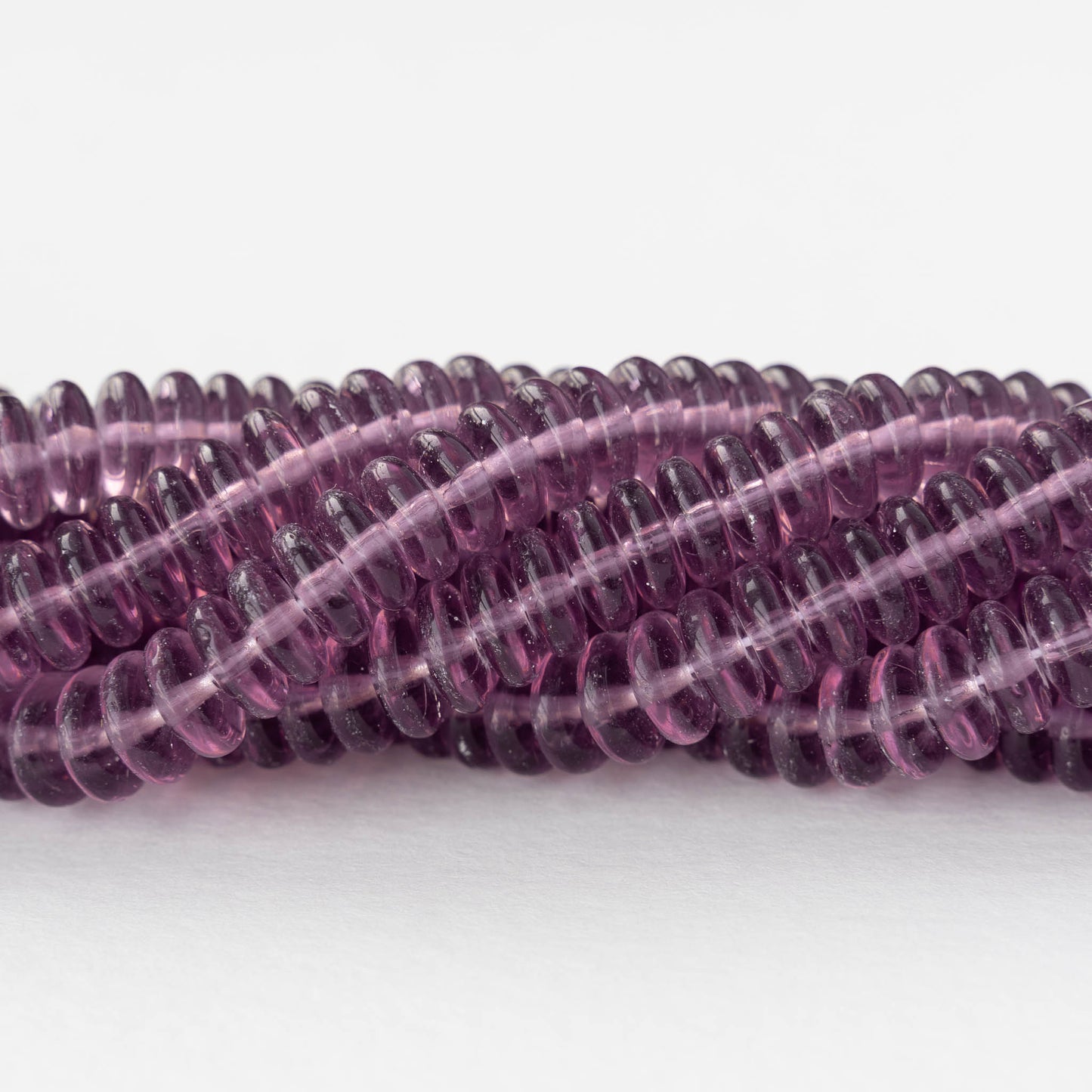 8mm Glass Rondelle Beads - Transparent Light Amethyst - 30 Beads