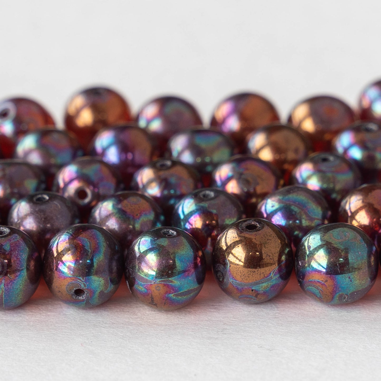 Bead, iridescent glass, translucent matte purple, 8mm round. Sold