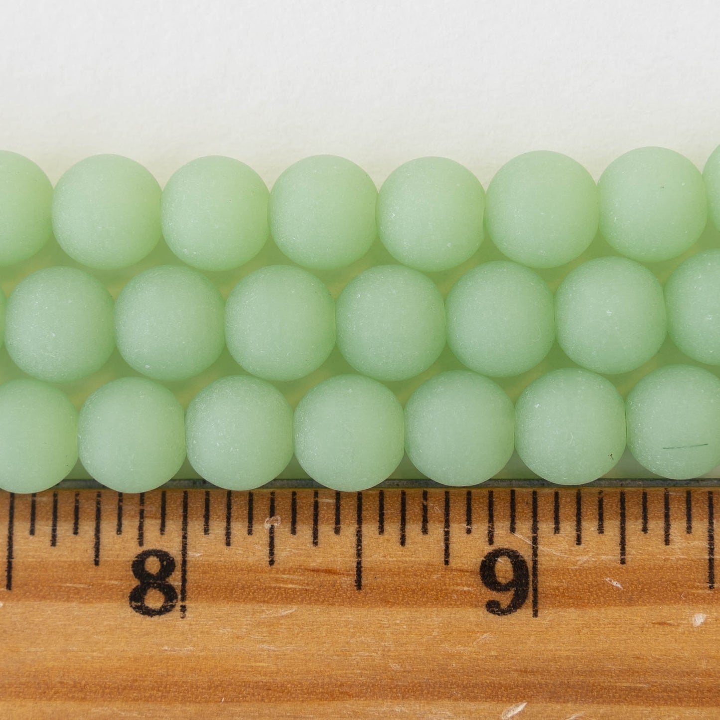 Load image into Gallery viewer, 10mm Frosted Glass Rounds - Opaque Celadon Green - 21 beads
