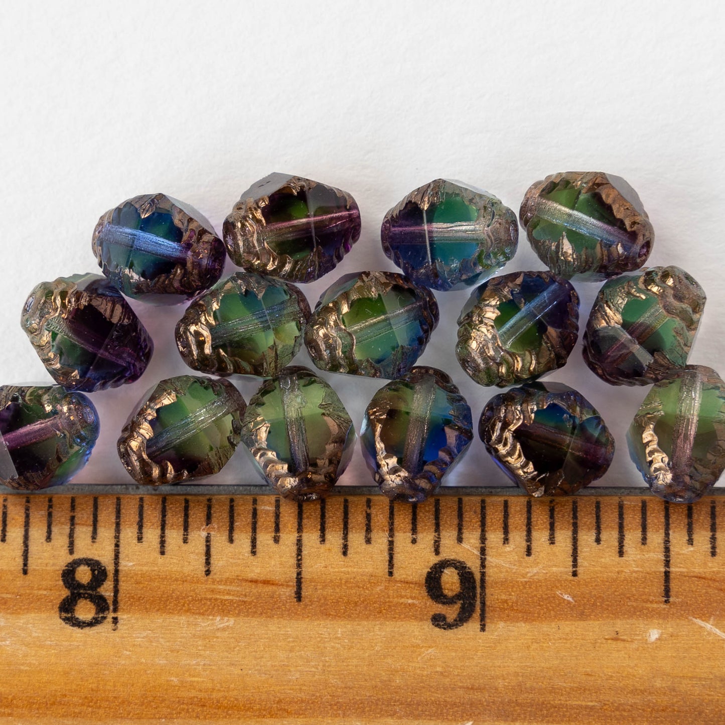 8x10mm Faceted Bicone - Transparent Blue, Purple and Green Bronze - 10 Beads