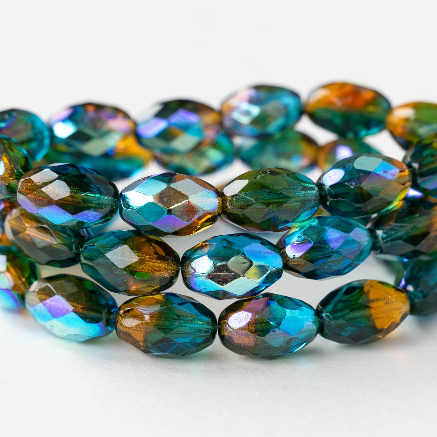 8x12mm Firepolished Glass Oval Beads - Blue Amber AB - 6 or 12 Beads