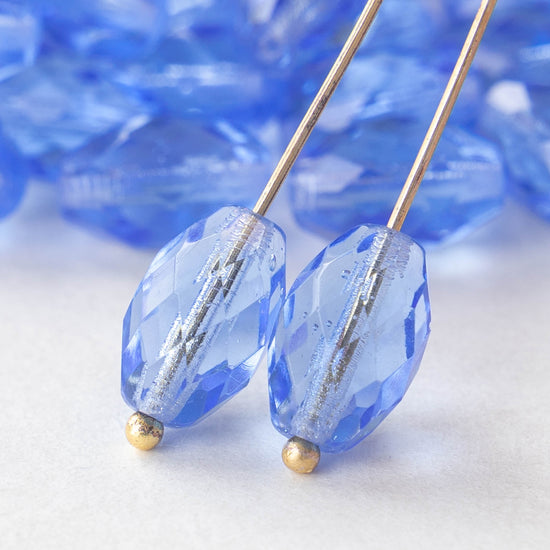 8x12mm Firepolished Glass Oval Beads - Light Sapphire Blue - 10 beads