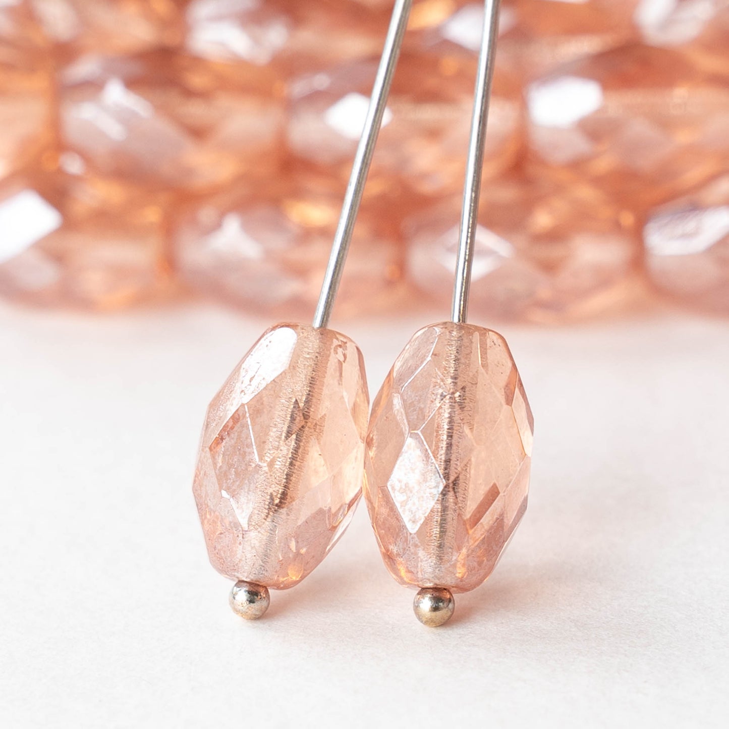 12mm Faceted Oval Beads - Rosaline Luster - 6 or 12 beads