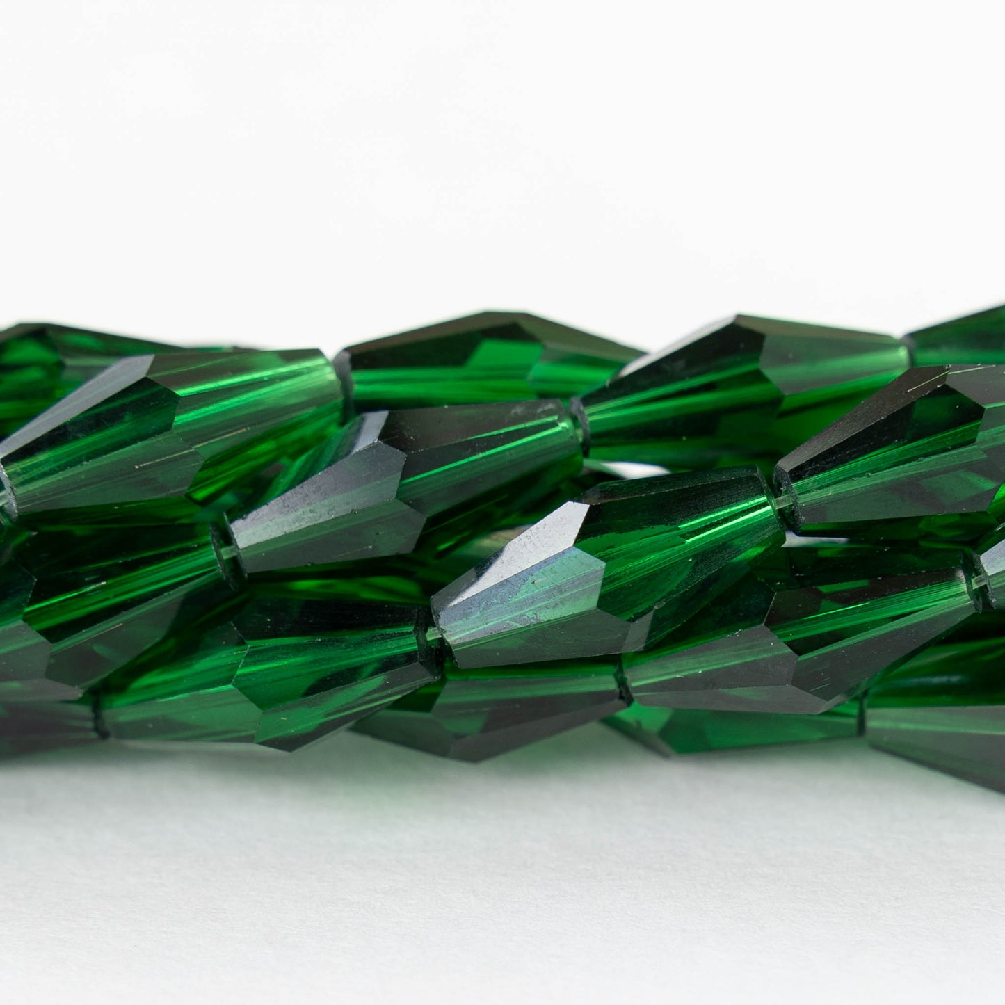 8x16mm Hand Cut Glass Long Bi-Cone Beads - Transparent Emerald Green - 25 Beads