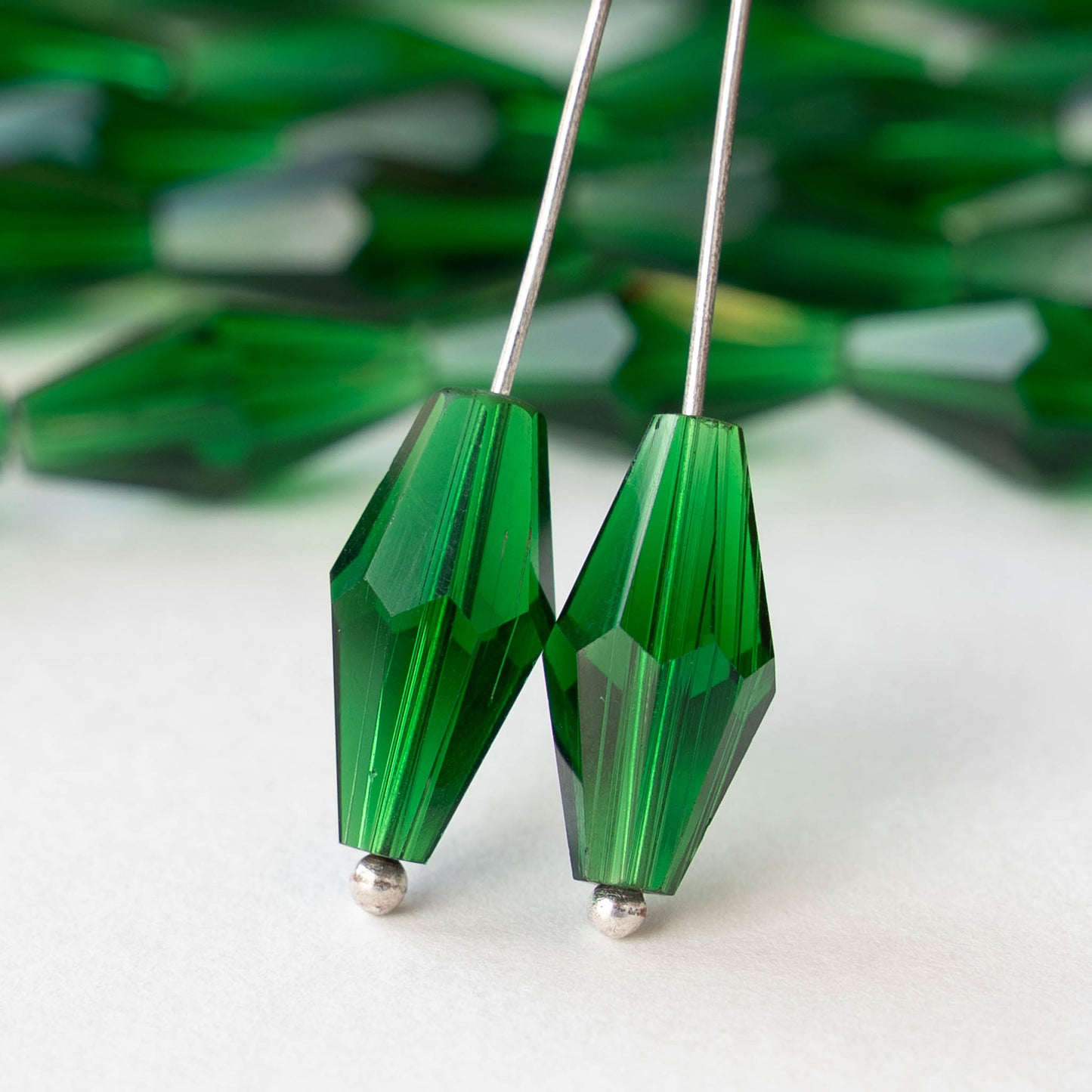 8x16mm Hand Cut Glass Long Bi-Cone Beads - Transparent Emerald Green - 25 Beads