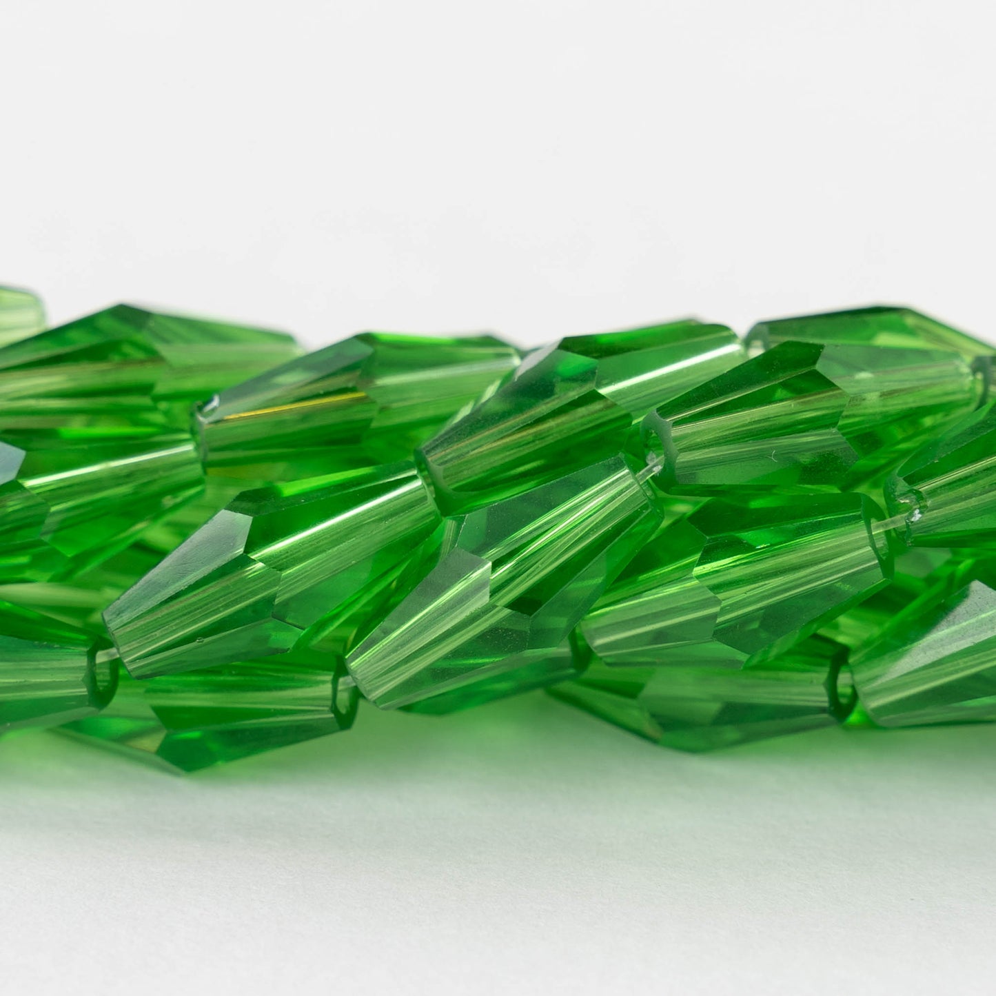 8x16mm Hand Cut Glass Long Bi-Cone Beads - Transparent Light Green - 26 Beads