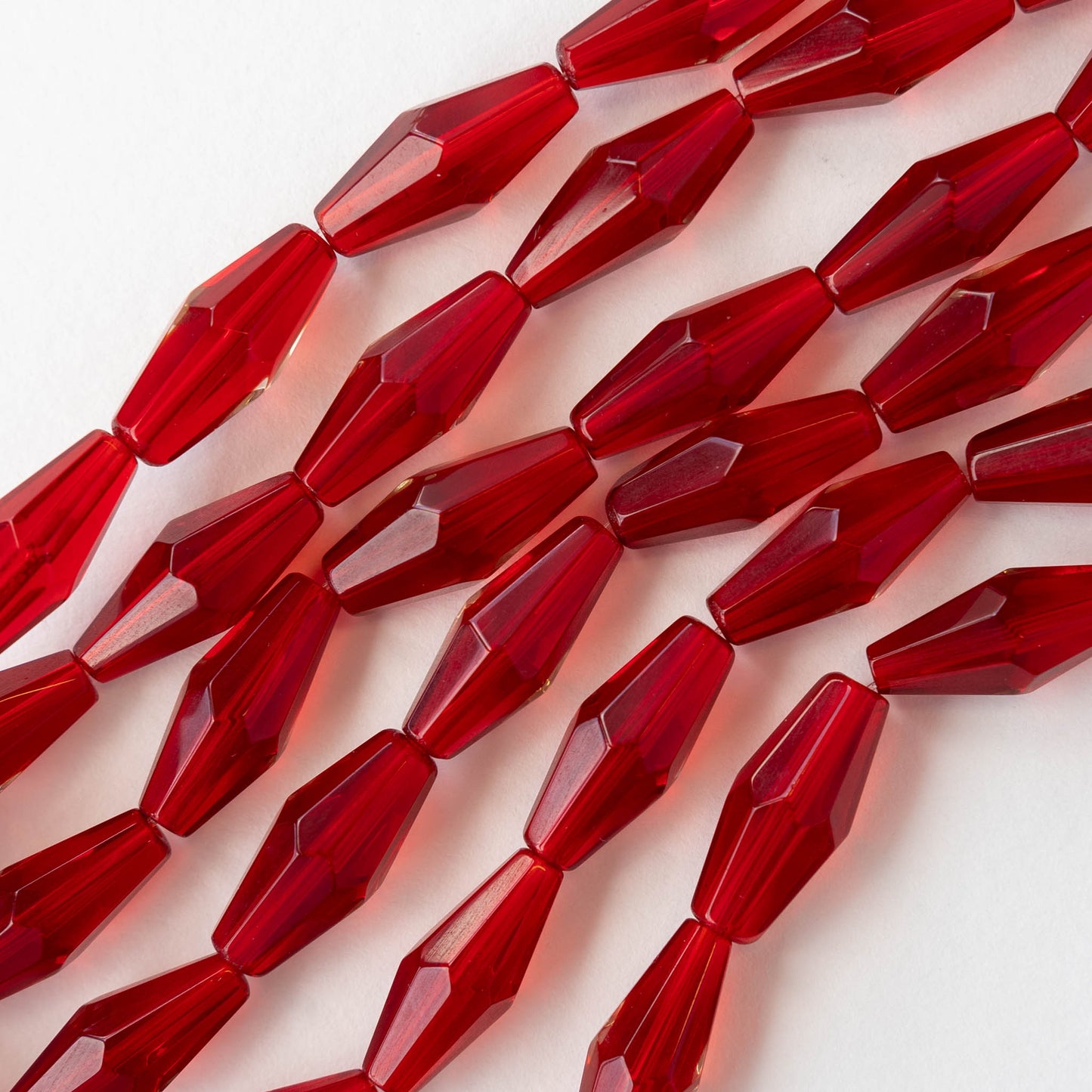 8x16mm Hand Cut Glass Long Bi-Cone Beads - Transparent Red - 24 Beads