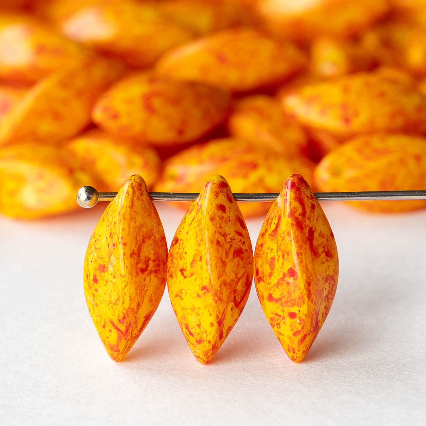 8x16mm Glass Twist Drop Beads - Yellow with Orange Dust - 10 beads