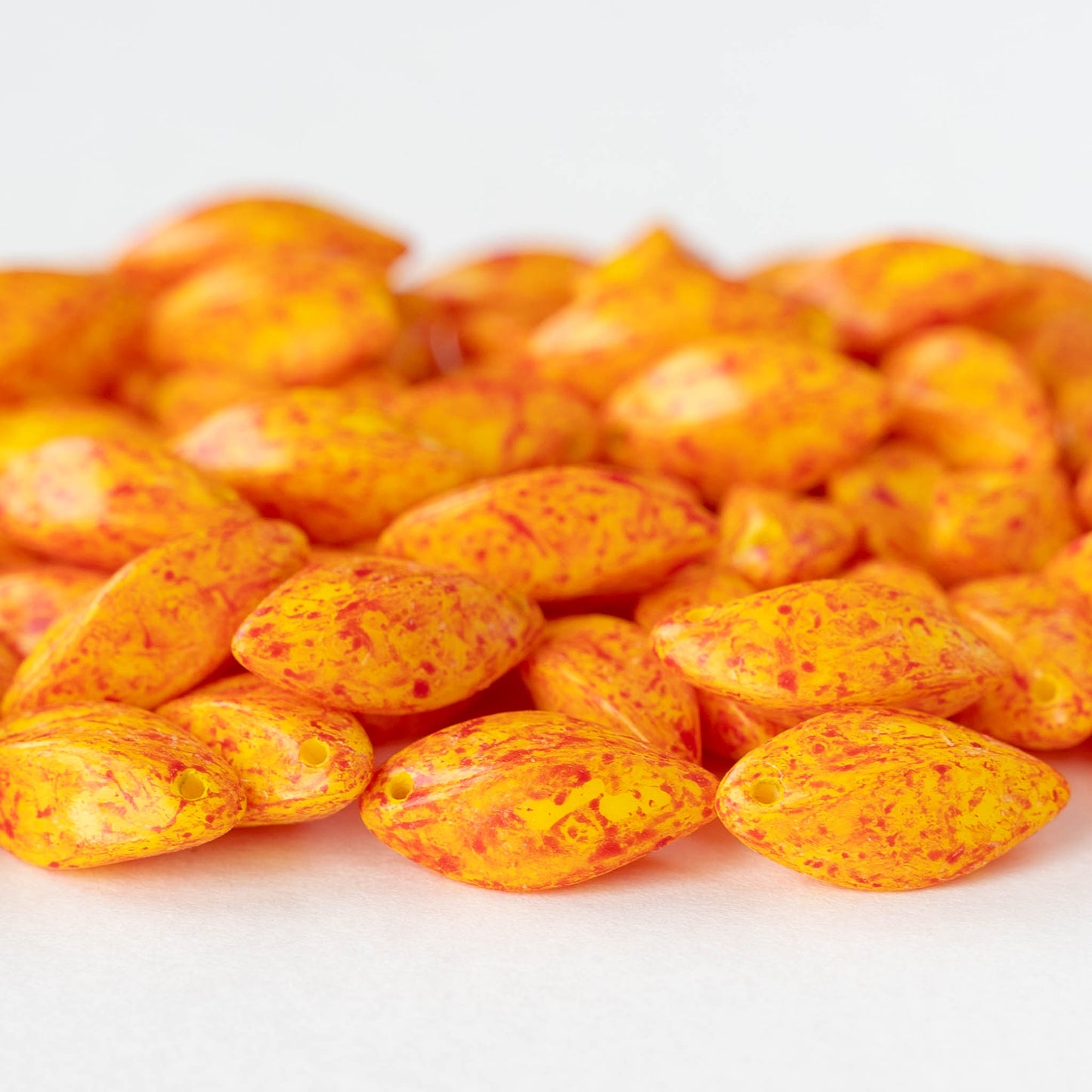 8x16mm Glass Twist Drop Beads - Yellow with Orange Dust - 10 beads