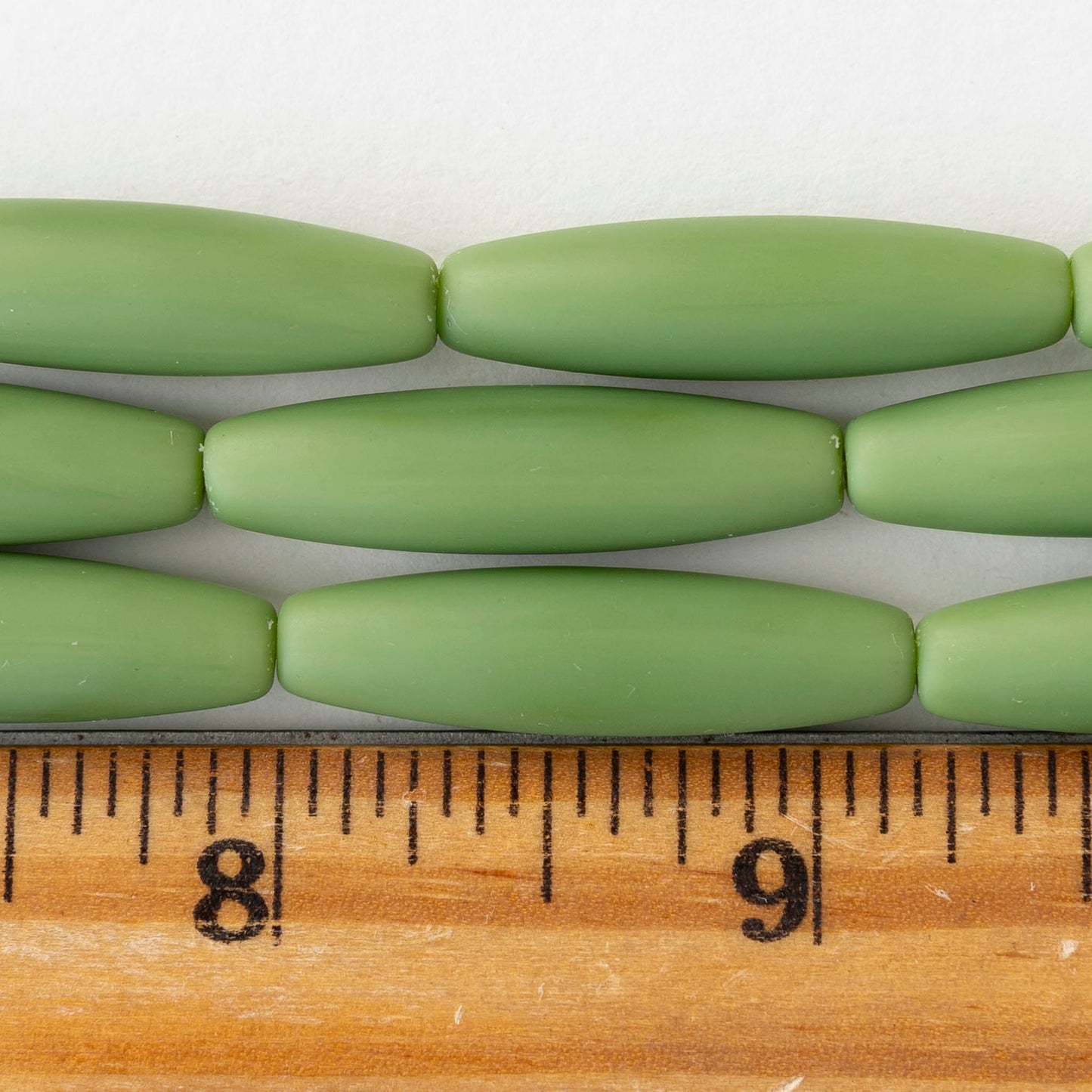 8x30mm Frosted Glass Tapered Tube Beads - Opaque Green - 10 beads