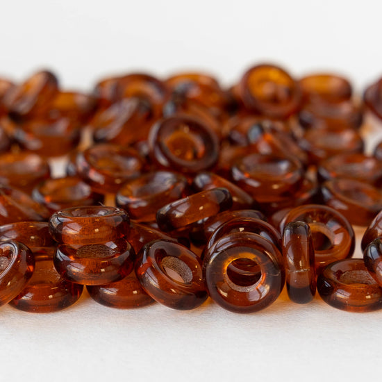 9mm Glass Ring Beads - Transparent Dark Amber - 25 Beads