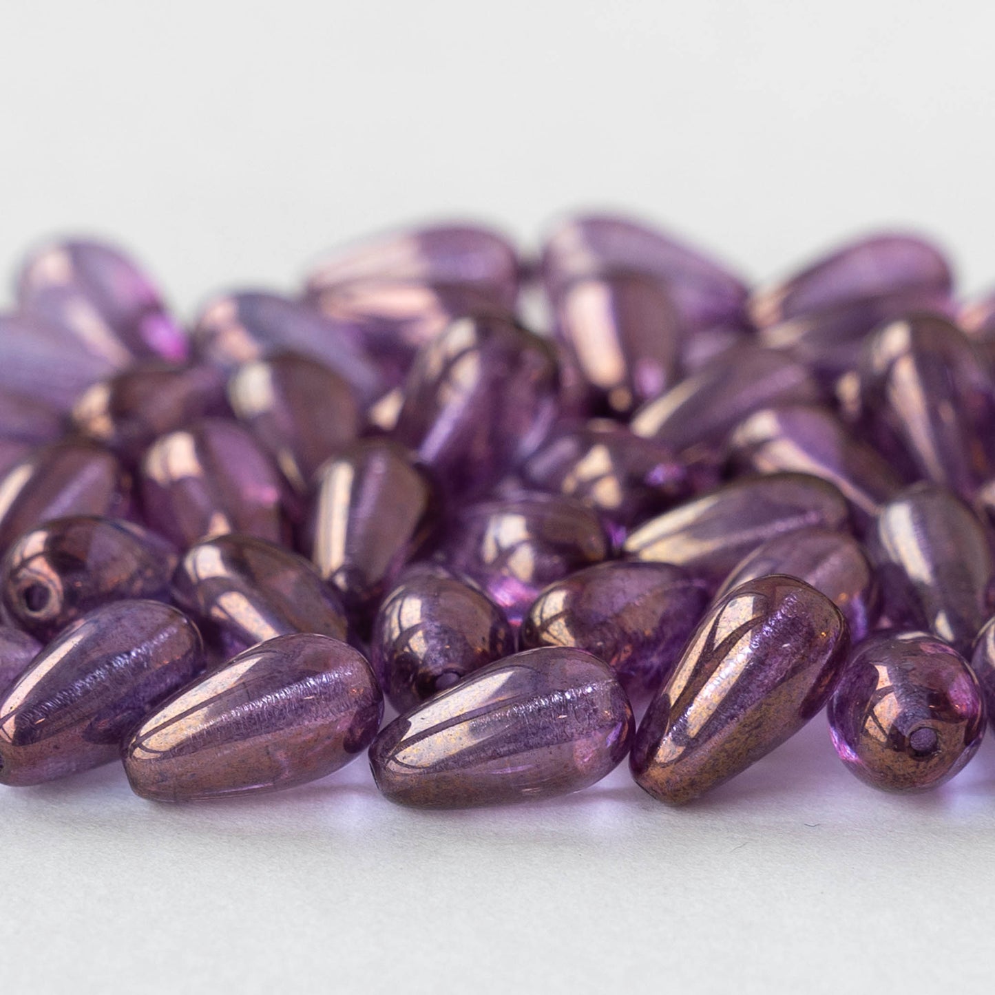 Load image into Gallery viewer, 10x9mm Long Drilled Drops - Amethyst with Gold - 50 Beads
