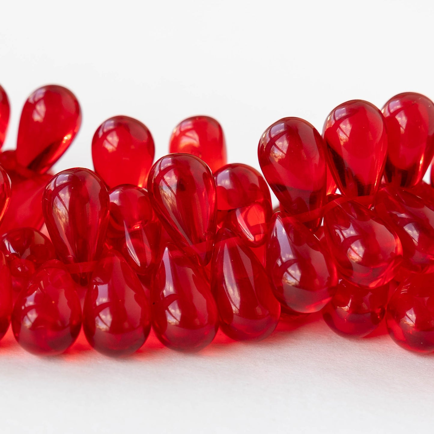 9x15mm Glass Teardrop Beads - Transparent Christmas Red - 12 Beads