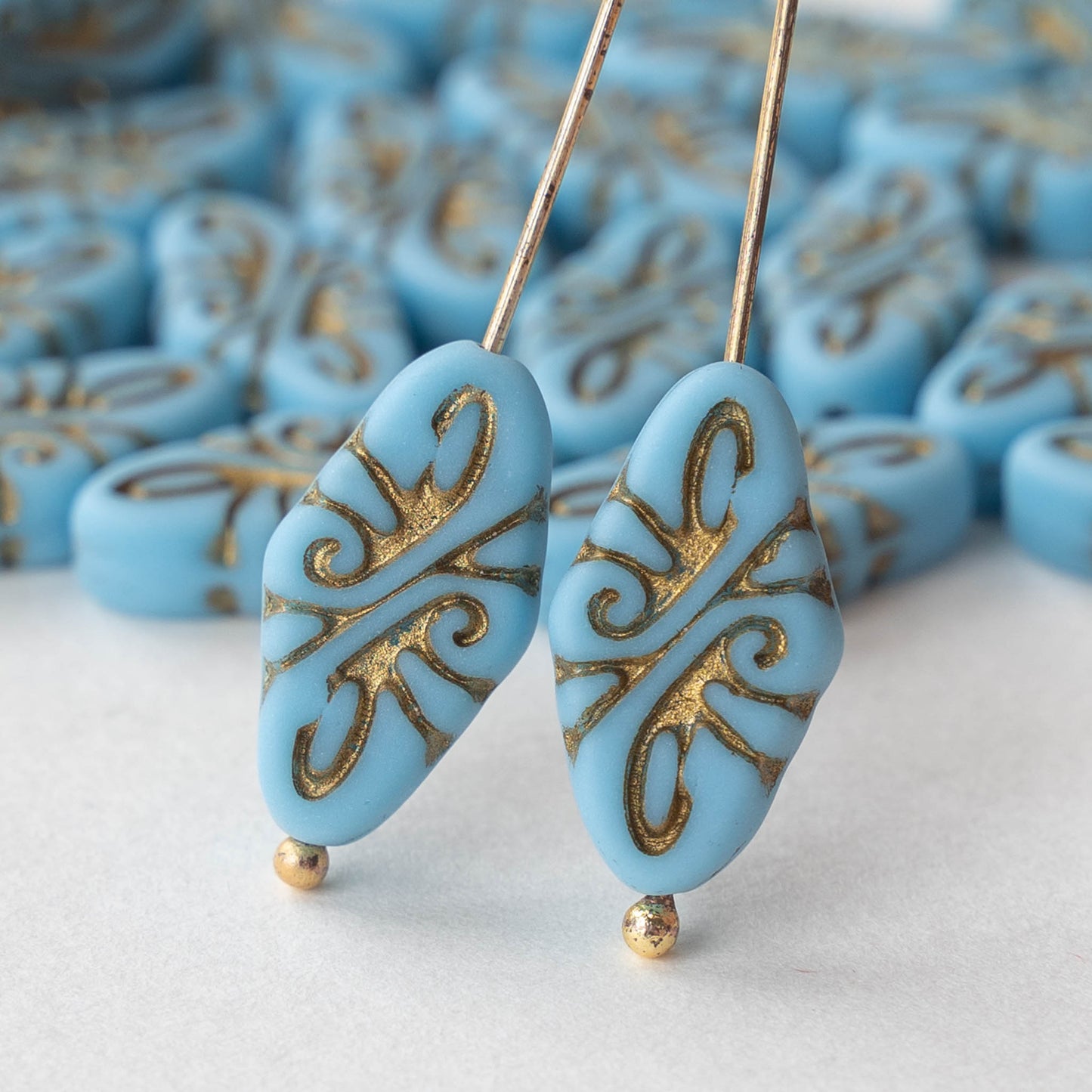 Oval Arabesque Beads - Blue Matte with Gold Wash - 10 beads