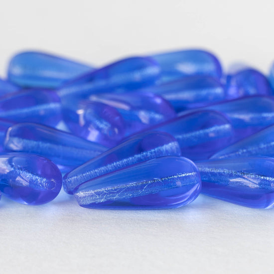 Load image into Gallery viewer, 9x20mm Glass Teardrops - Sapphire Blue - 20 beads
