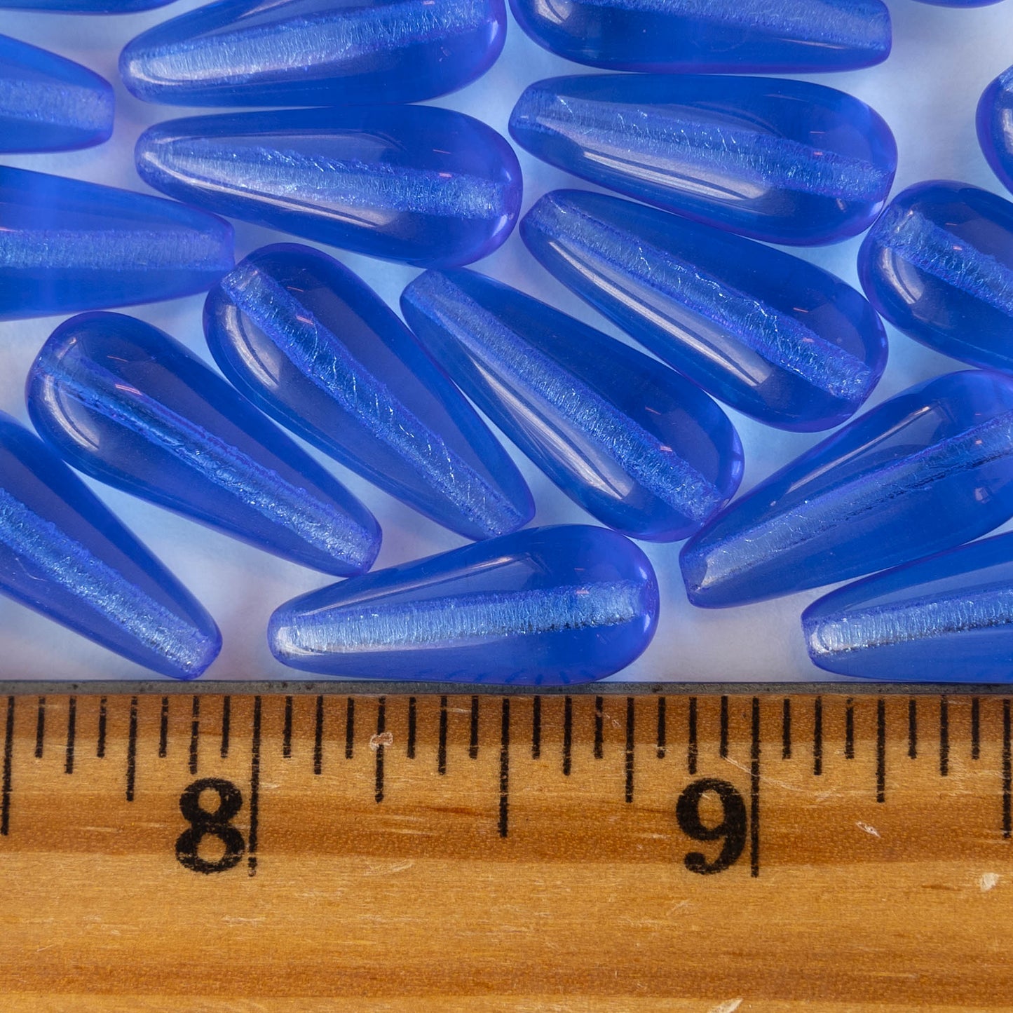 Load image into Gallery viewer, 9x20mm Glass Teardrops - Sapphire Blue - 20 beads
