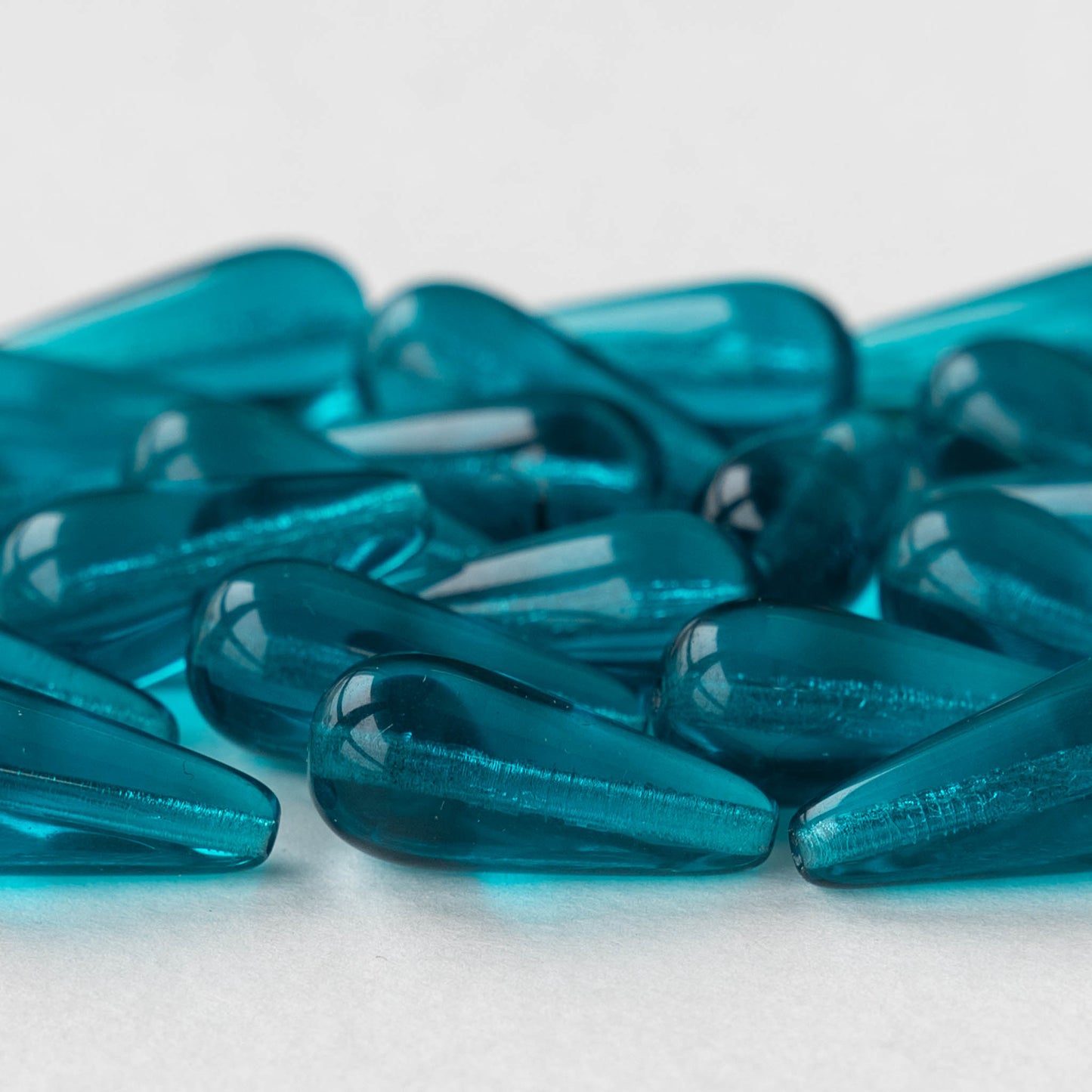 Load image into Gallery viewer, 9x20mm Long Drilled Drops - Teal - 20 Beads
