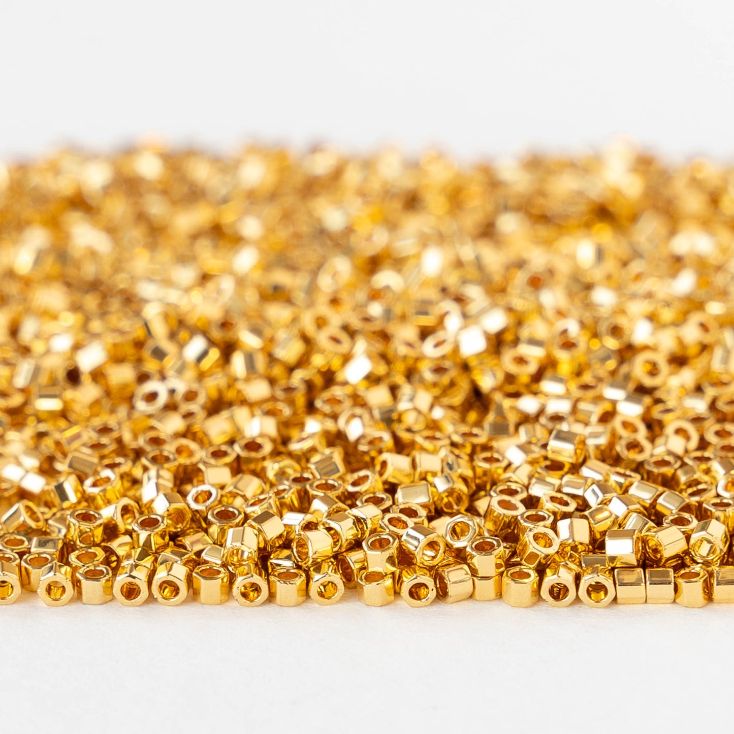 1mm Delica Hex Cut Seed Beads - 24K Bright Gold - 2.5 grams