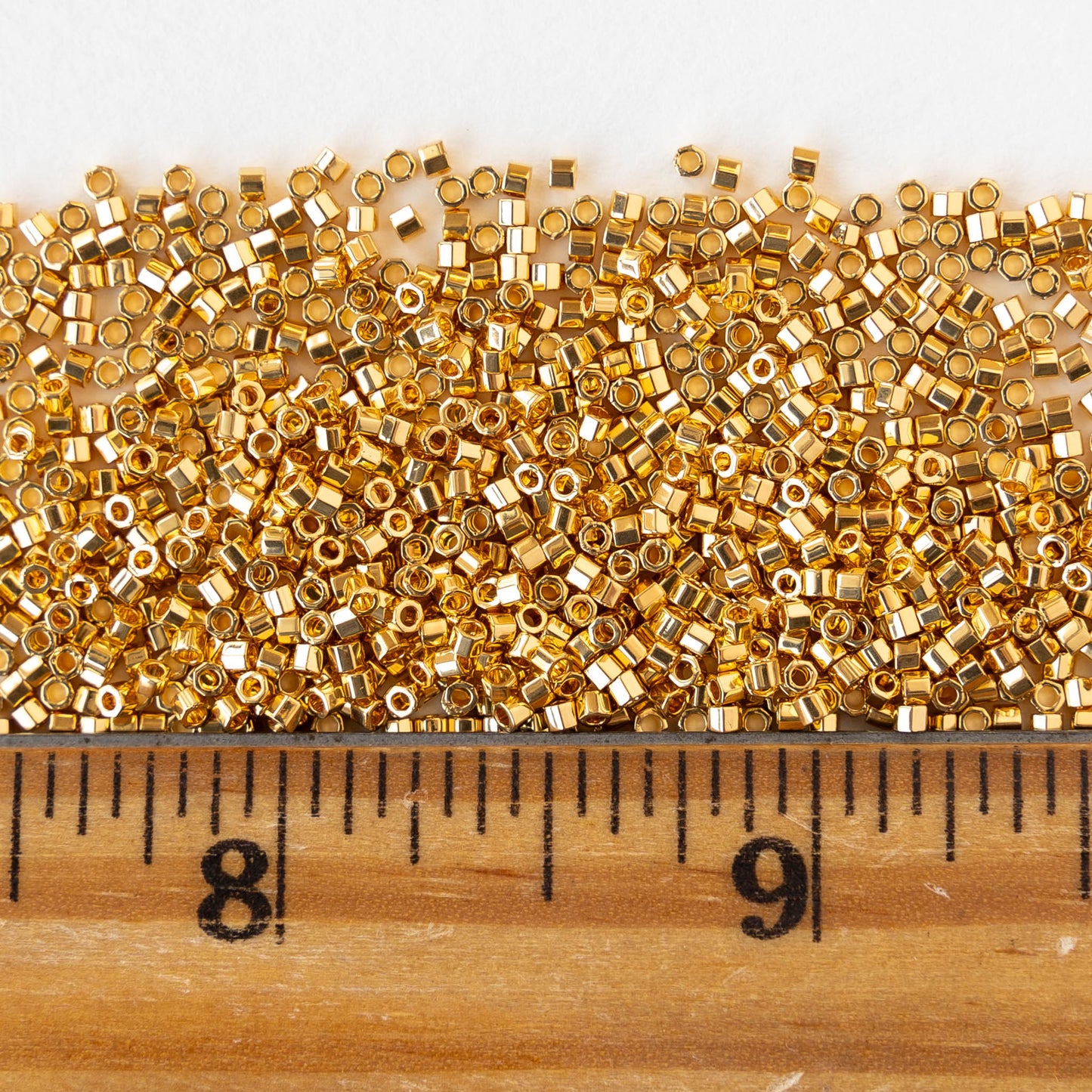 1mm Delica Hex Cut Seed Beads - 24K Bright Gold - 2.5 grams