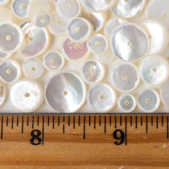 Graduated Mother of Pearl Disk Beads - 8 Inches -80 beads)
