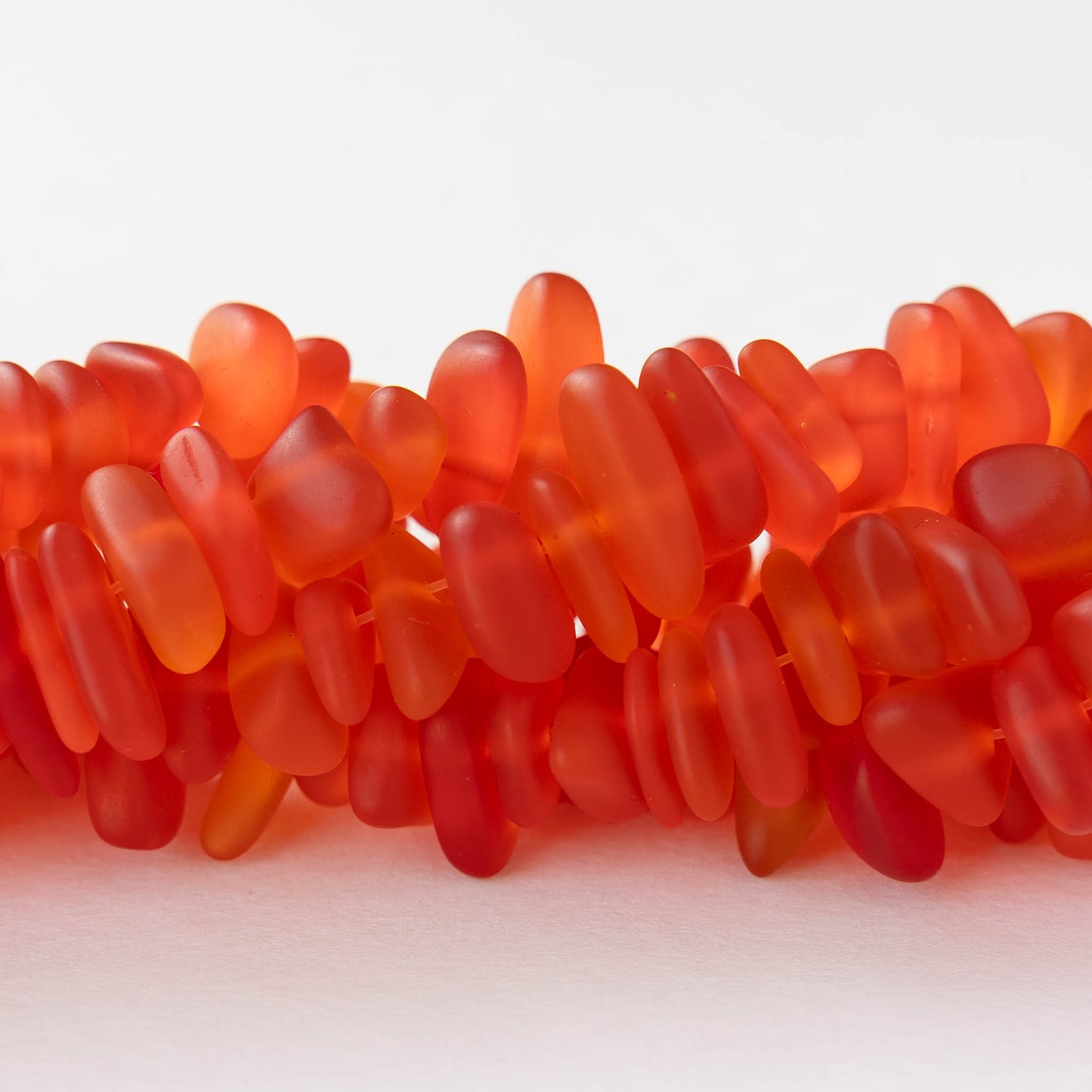 Frosted Glass Pebbles - Orange - 50 Beads