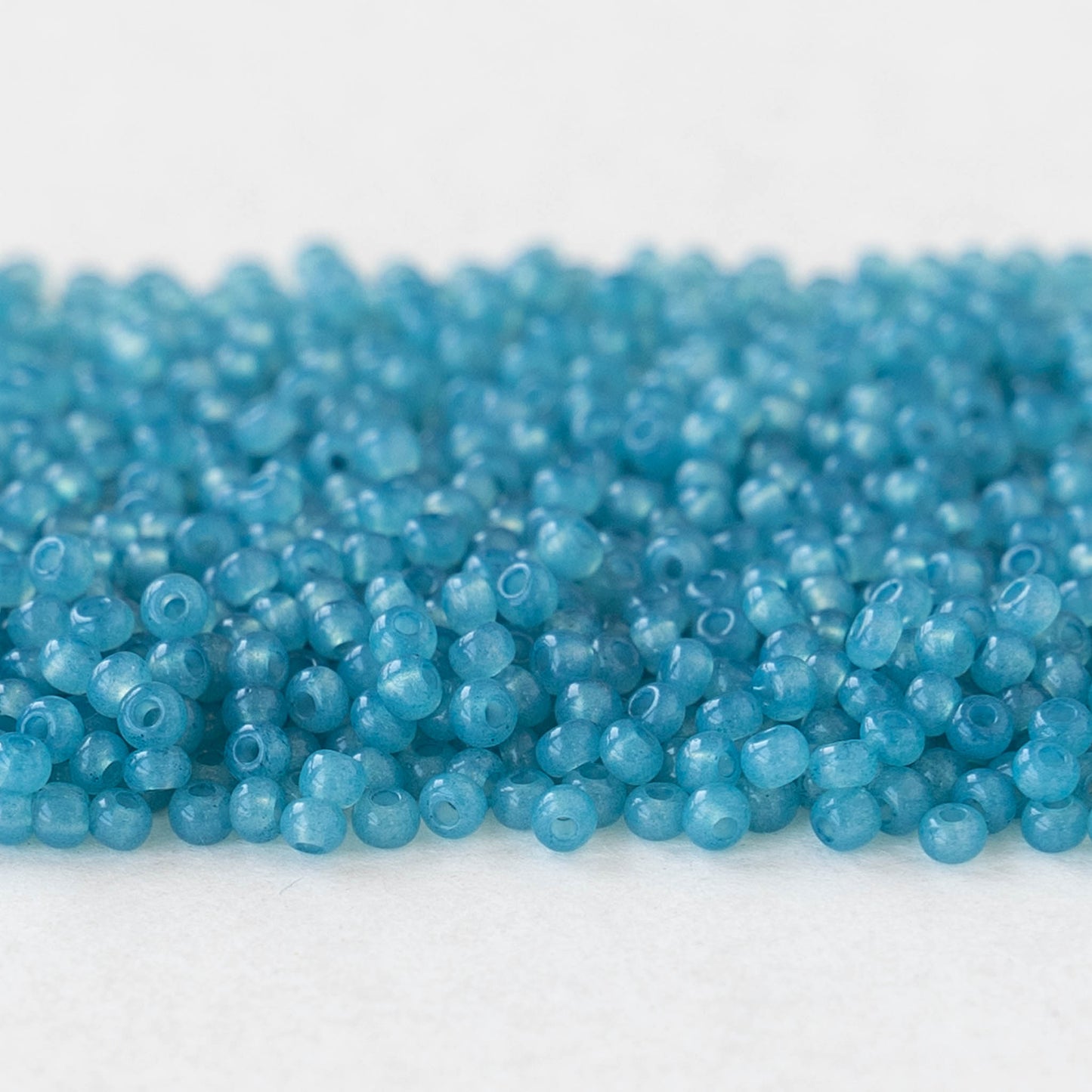 Load image into Gallery viewer, 11/0 Seed Beads - Sol Gel African Opal Blue- 24 gram Tube
