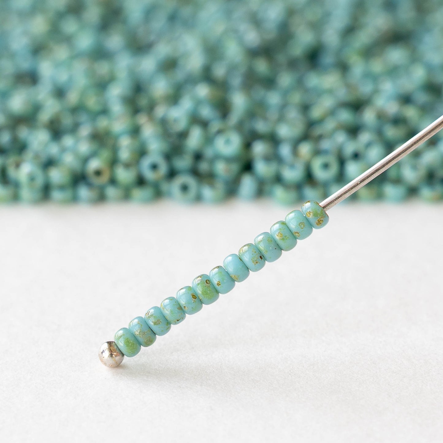 11/0 Glass Seed Beads - Opaque Seafoam Picasso - 10 grams