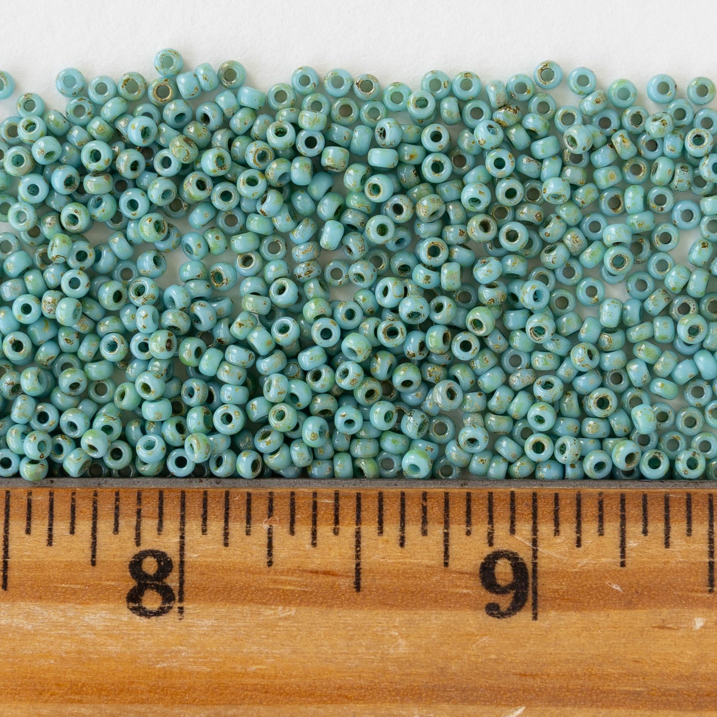 11/0 Glass Seed Beads - Opaque Seafoam Picasso - 10 grams