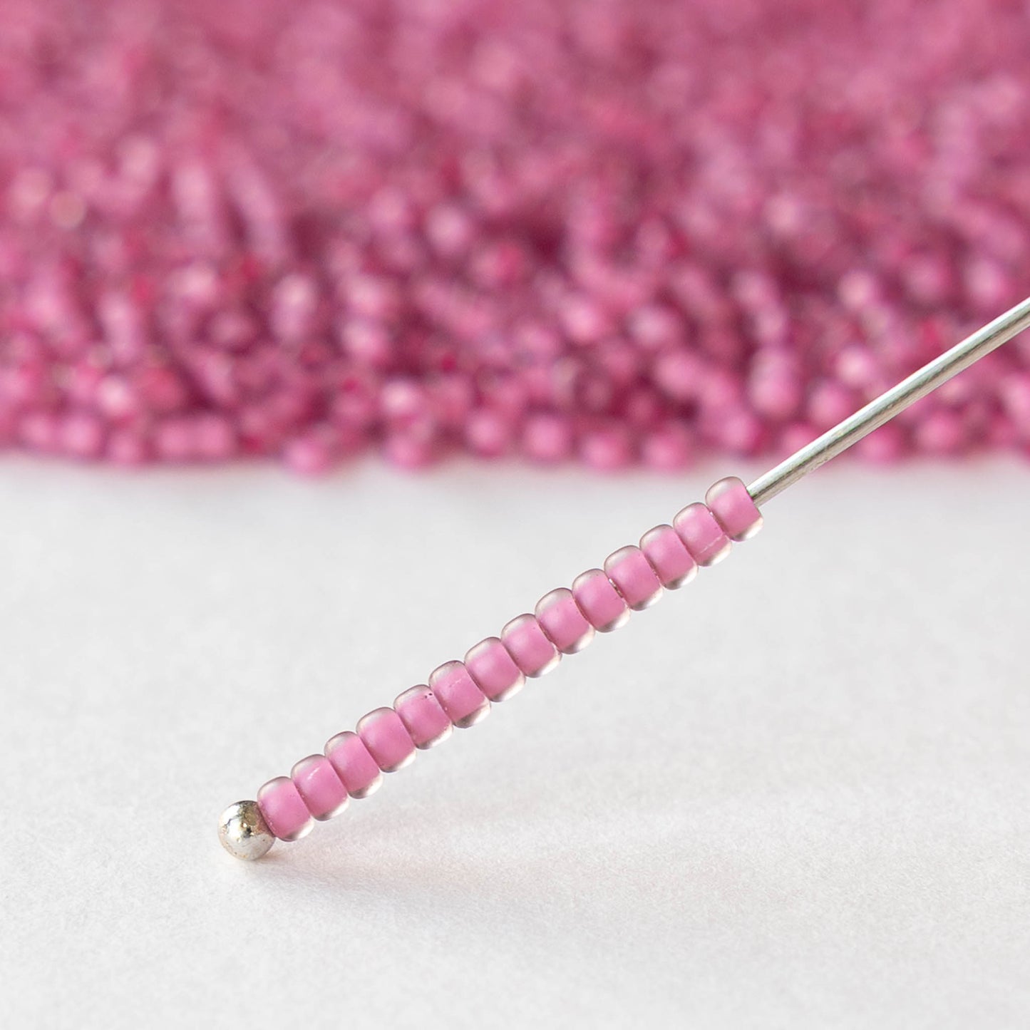 11/0 Glass Seed Beads - Pink Lined Crystal - 20 grams