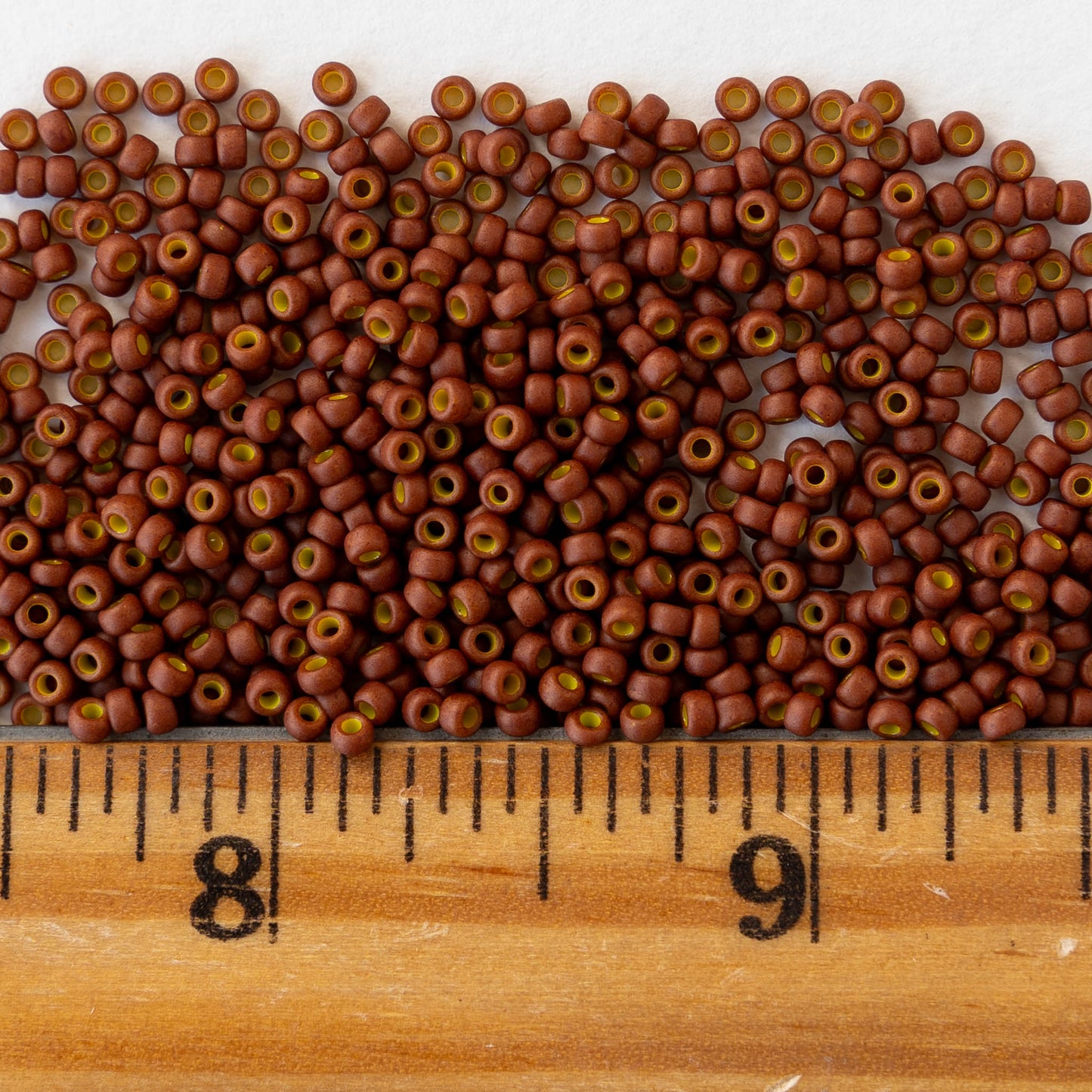 11/0 Seed Beads - Opaque Yellow Lined Matte Brown - 24 grams