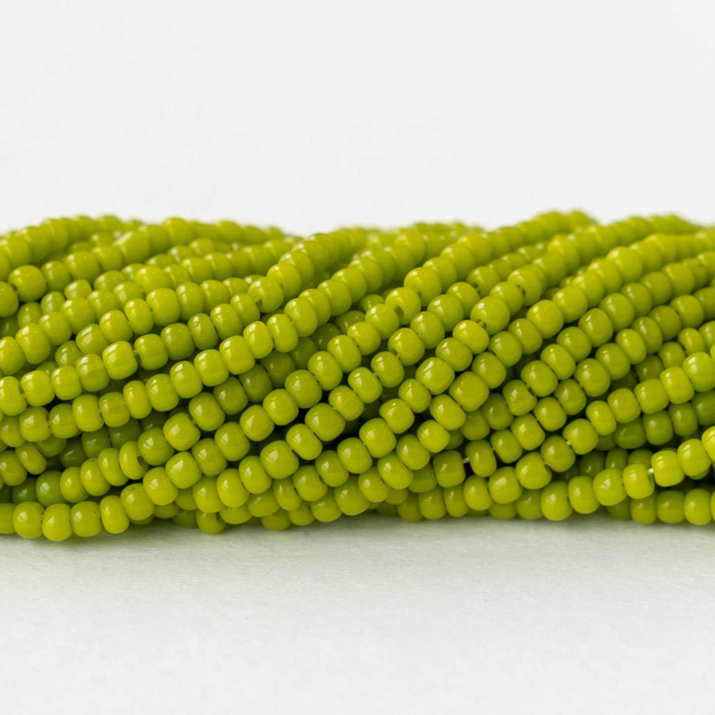 13/0 Seed Beads - Opaque Olivine - 20 inch strands - Whole or Half hank