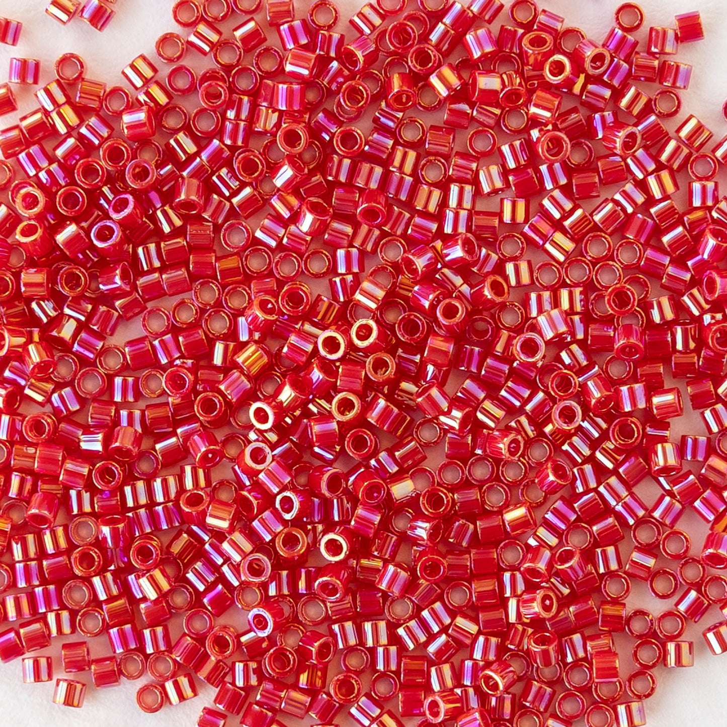 15/0 Delica Seed Beads - Transparent Magenta AB - 5 grams